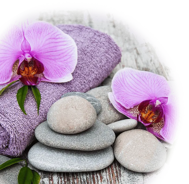 Calming spa towels, stones and orchids